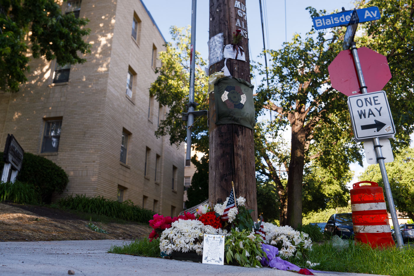 Flowers at the Jamal Mitchell Memorial on Blaisdell Ave