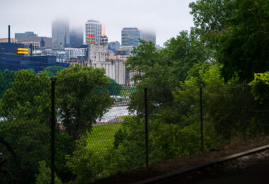 Yet another night of rainy weather in Minneapolis. This time with a touch of fog covering the tops of the downtown buildings.