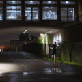 A jogger on the Midtown Greenway after rain moves through the area. The Greenway runs through South Minneapolis.