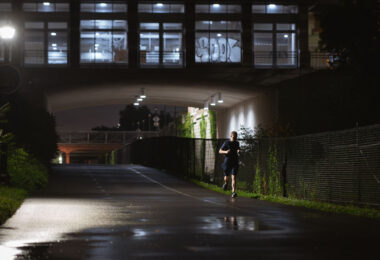 A jogger on the Midtown Greenway after rain moves through the area. The Greenway runs through South Minneapolis.