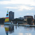 People watch the susnet from Bde Maka Ska in Minneapolis.