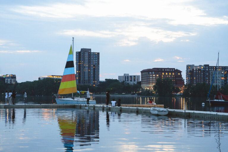 Bde Maka Ska in Minneapolis 1 People watch the susnet from Bde Maka Ska in Minneapolis.