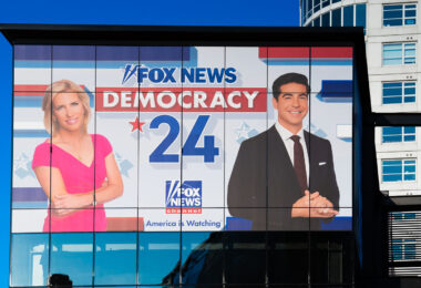 A Fox News banner with Laura Ingraham and Watters on it outside the 2024 Republican National Convention.