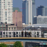 Officers stand on a walkway over the freeway during the Republican National Convention.