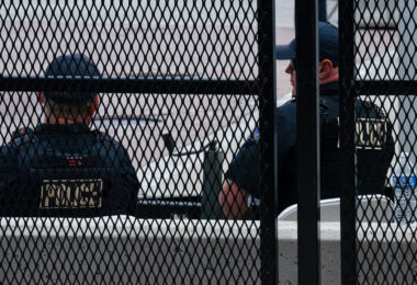 Police officers behind the secure perimeter at the 2024 Republican National Convention in Milwaukee.