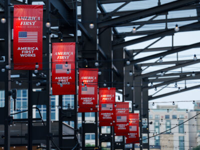 America First Policy Institute banners at Milwaukee RNC