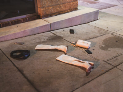Discarded Boots, Purse, and Phones on Lagoon Ave, Minneapolis