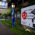 President Joe Biden's Bipartisan Infrastructure Law sign on the Midtown Greenway in Uptown Minneapolis.