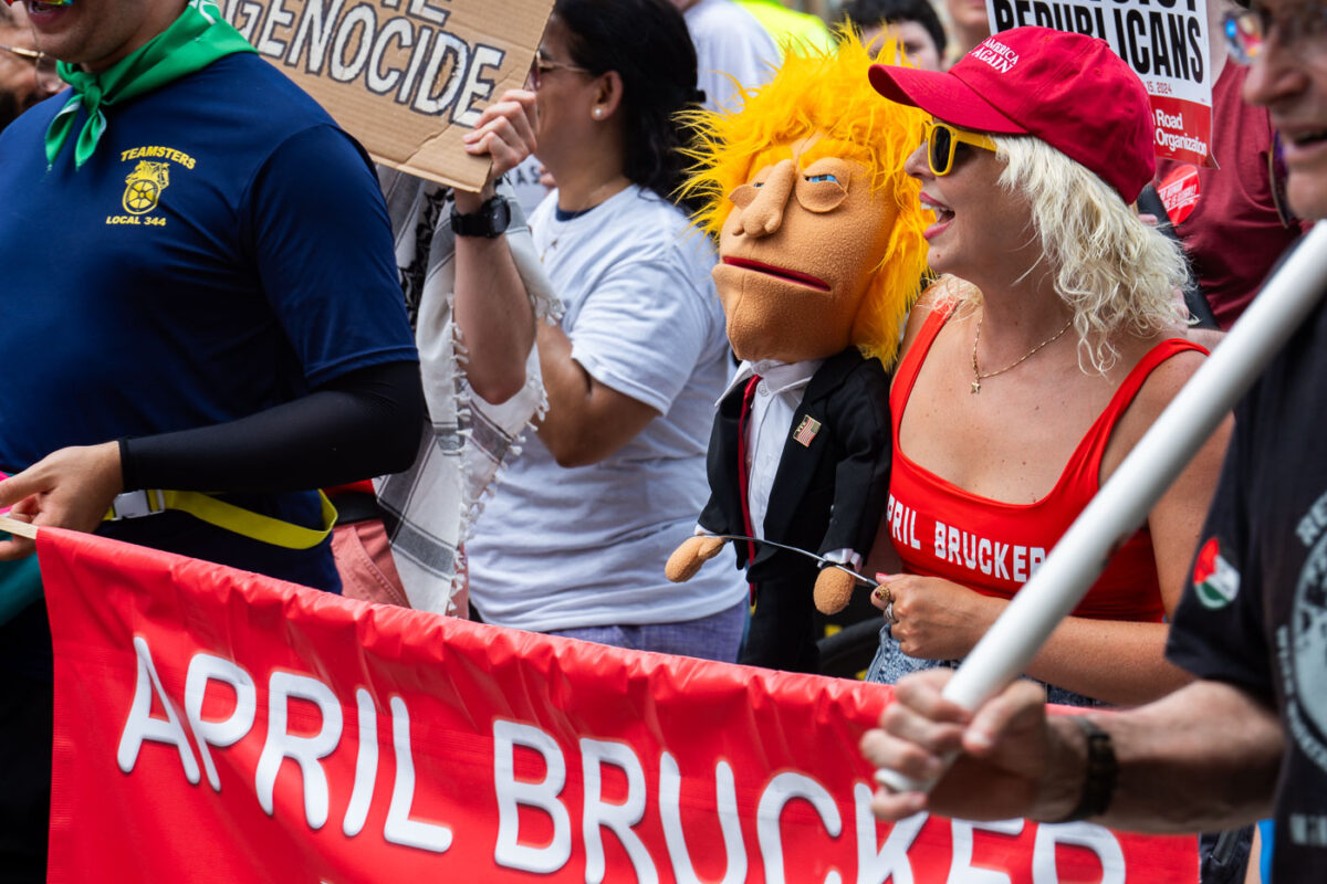 Las Vegas ventriloquist April Brucker and her puppet “Donald J. Tramp” marching at the 2024 Republican National Convention.