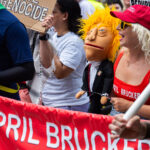 Las Vegas ventriloquist April Brucker and her puppet “Donald J. Tramp” marching at the 2024 Republican National Convention.