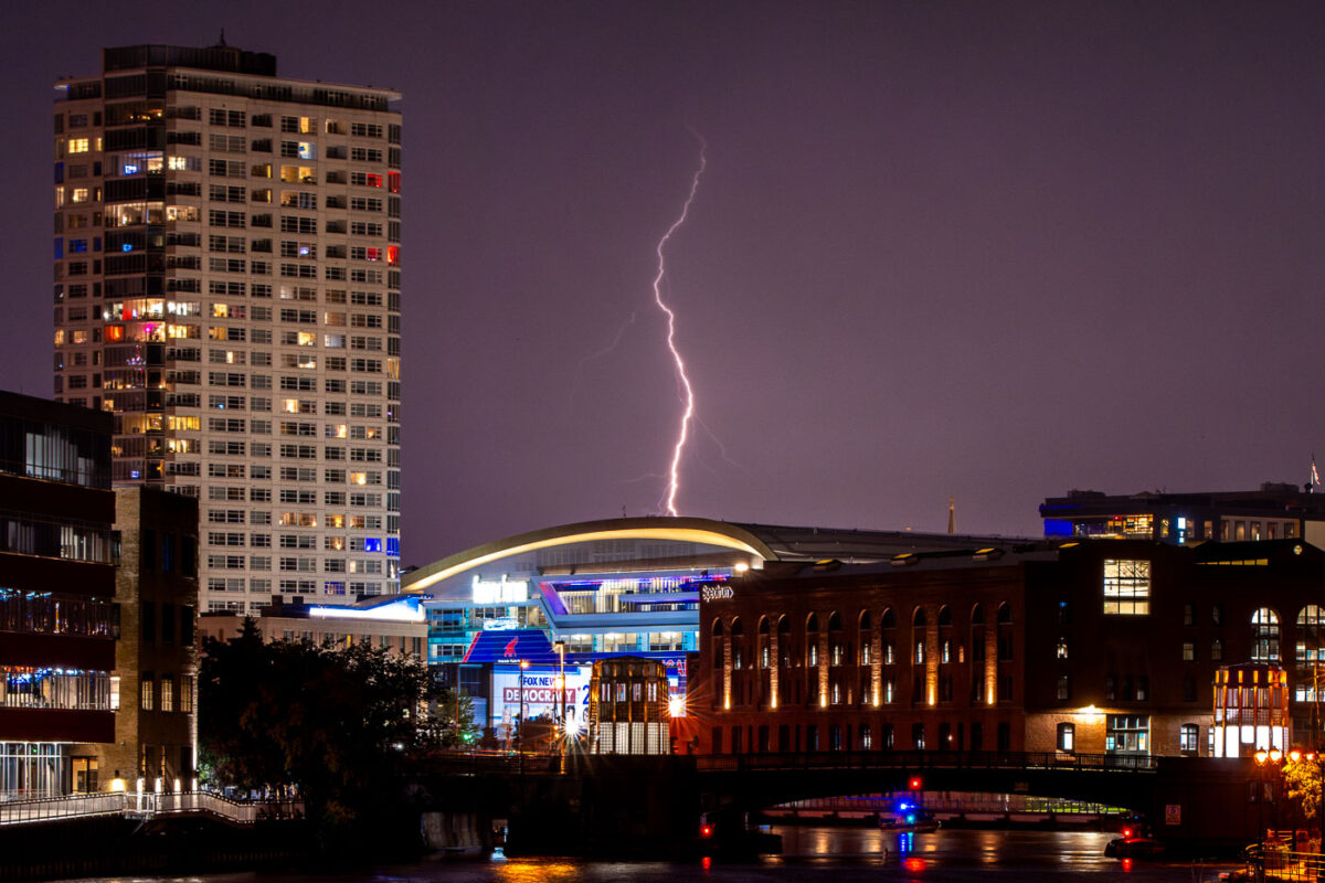 Lightning hits Fiserv Forum in Milwaukee tonight as former President Trump makes an appearance at Day 1 of the 2024 Republican National Convention. With a bandage on his ear following an assassination attempt 2 days ago, he appeared for the first time with chosen VP, J.D. Vance.