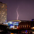 Lightning hits Fiserv Forum in Milwaukee tonight as former President Trump makes an appearance at Day 1 of the 2024 Republican National Convention. With a bandage on his ear following an assassination attempt 2 days ago, he appeared for the first time with chosen VP, J.D. Vance.