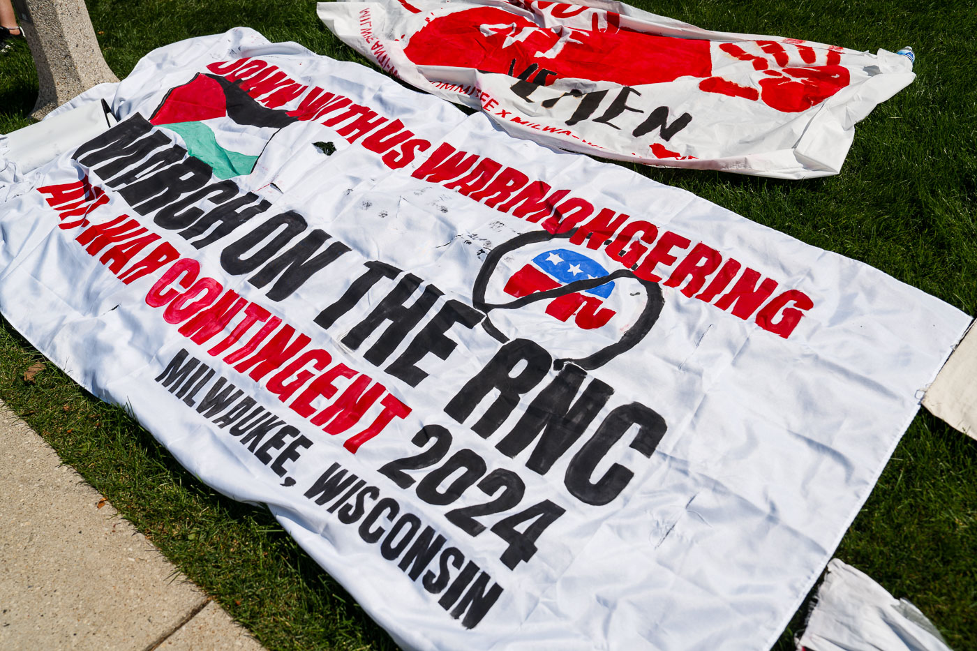 A March On The RNC Anti-War Contingent banner in Milwaukee.Thousands of protesters marched on July 15th 2024 outside the Republican National Convention in Milwaukee.