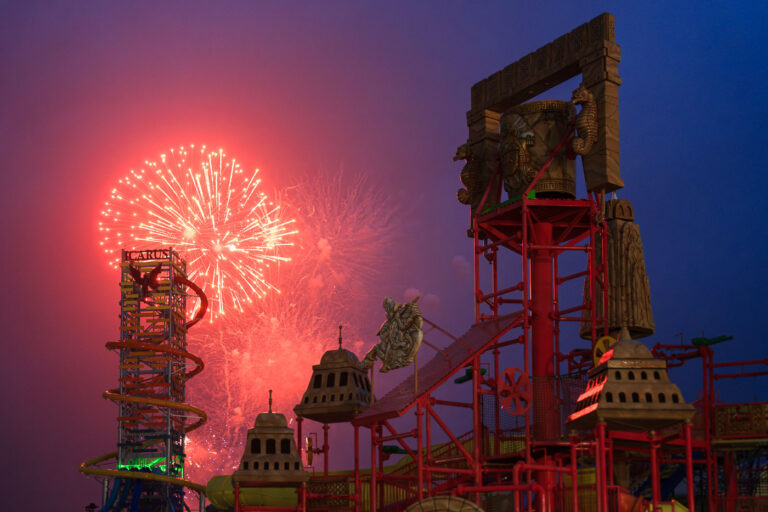 America's Tallest Waterslide at Mt. Olympus 2 While other cities and resorts around Wisconsin Dells postponed July 4th fireworks due to weather, Mt Olympus said the show must go on. Fireworks lit up the sky behind The Rise of Icarus, America’s tallest waterslide (145ft) that opened a few weeks ago.