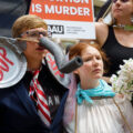 Protesters from the Progressive Anti-Abortion Uprising organization at the 2024 Republican National Convention in Milwaukee.