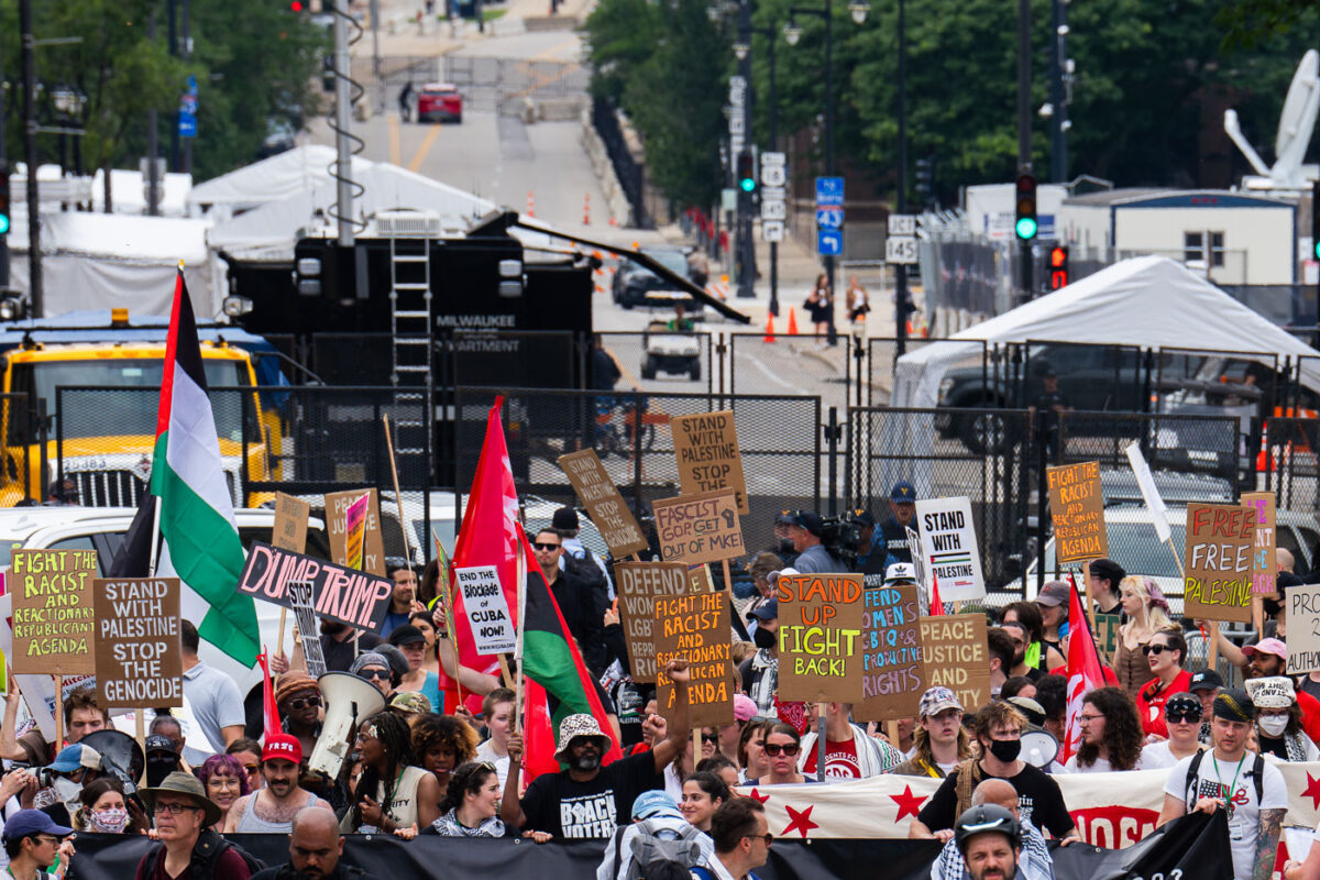 Protesters march to the secure perimeter around the 2024 Republican National Convention.