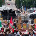 Protesters march to the secure perimeter around the 2024 Republican National Convention.