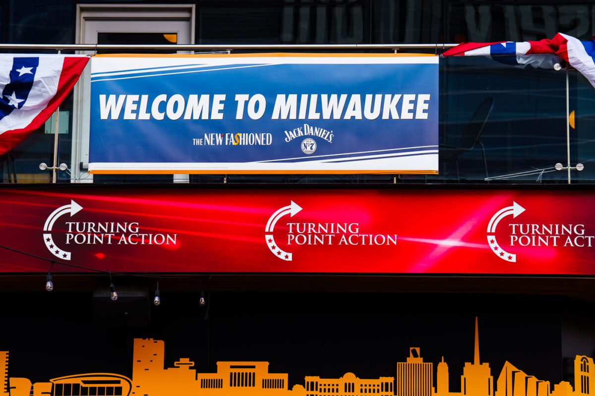 Welcome to Milwaukee and Turning Point Action signage across from the Fiserv Forum. The forum is hosting the 2024 Republican National Convention.