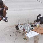 Carlos Davis at a memorial in Milwaukee where Samuel Sharpe Jr. was killed by Columbus Police. Milwaukee Police has said 5 Columbus officers, who are in town for the RNC, shot the man after they witnessed an altercation with another man in which Sharpe refused to drop a knife.