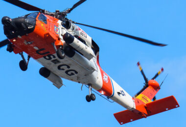 A United States Coast Guard helicopter flies over the Summerfest grounds in Milwaukee where a RNC welcome party is taking place.