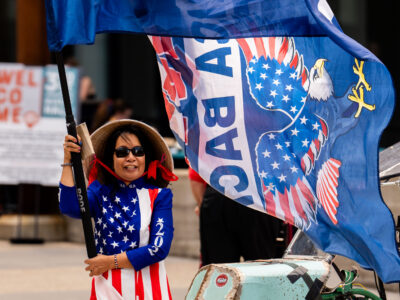 Woman with Trump Flag at 2024 RNC in Milwaukee
