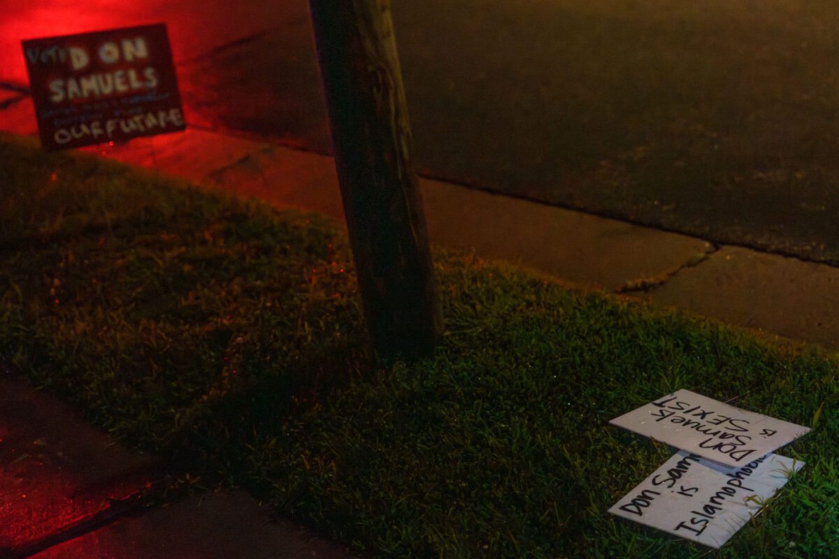 Yard signs mentioning Don Samuels laying nerxt to a Don Samuels yard sign in Minneapolis.