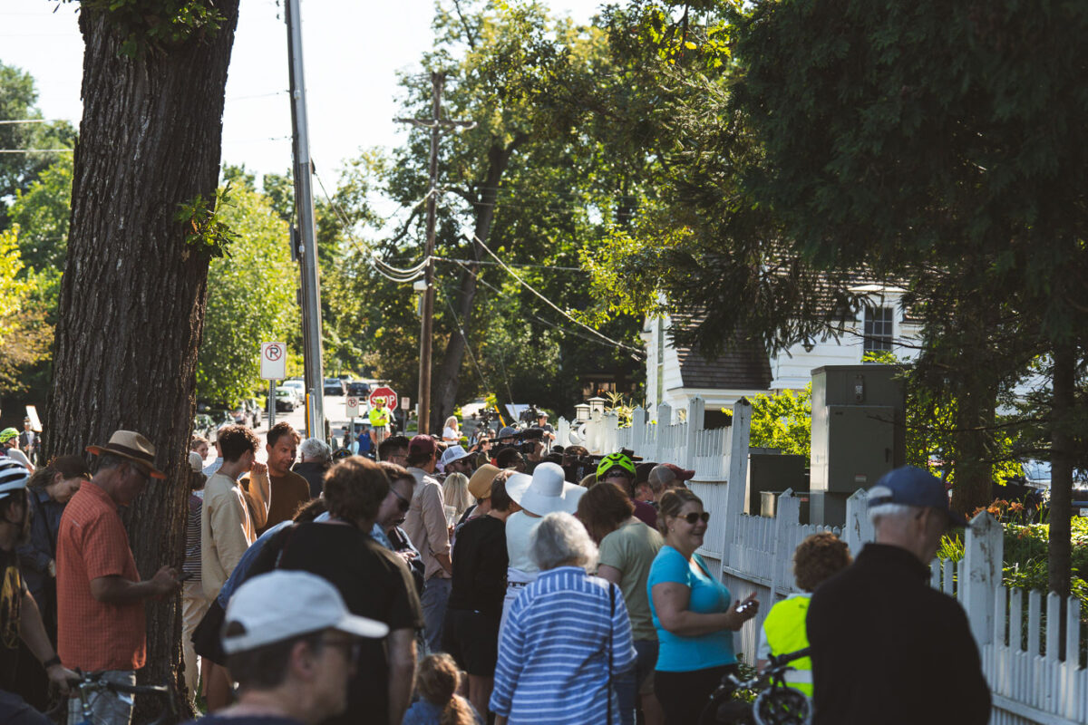 Crowds gather outside the Governor's Mansion prior to Tim Walz leaving for Philadelphia where he would be announced as Kamala Harris's running mate.