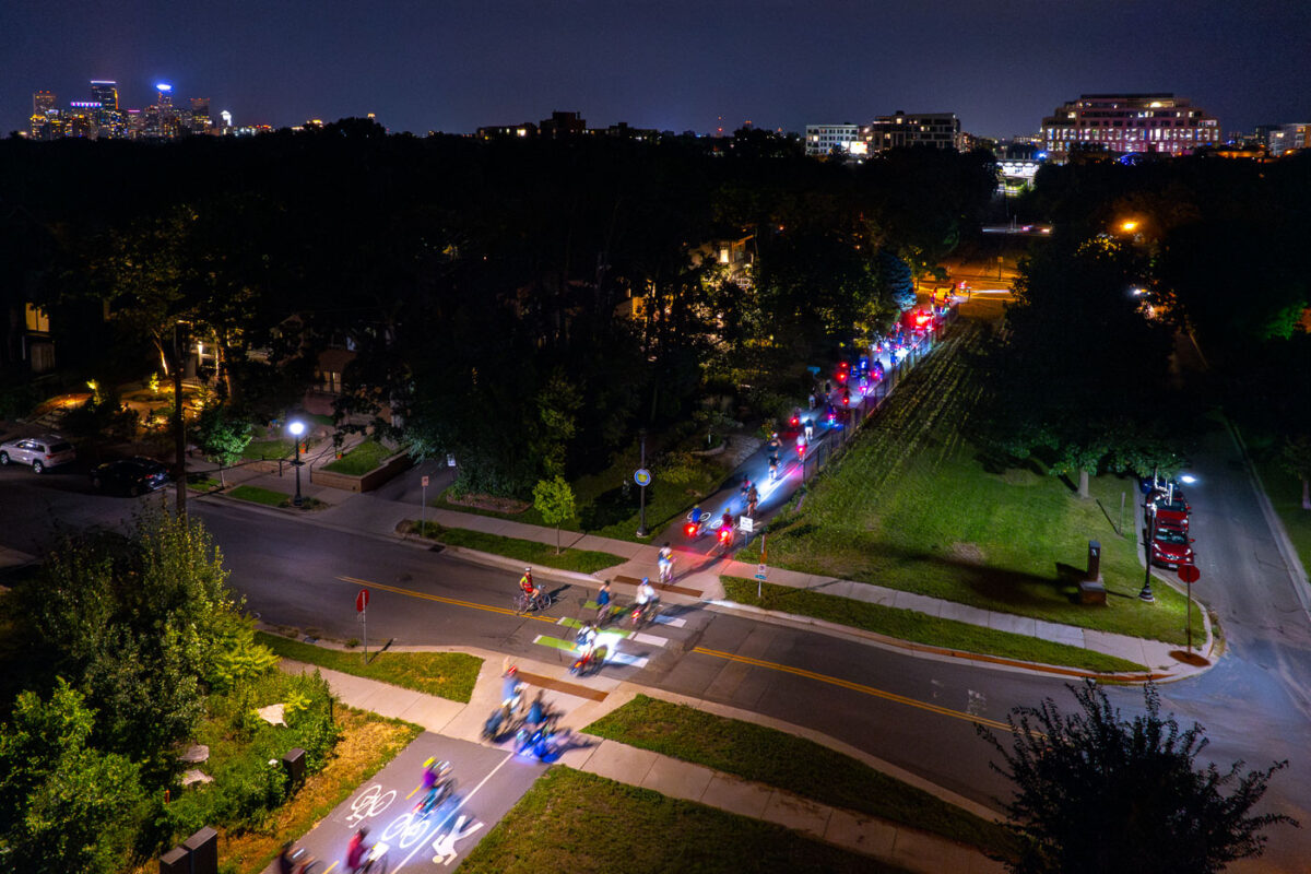 Bikers head down the Midtown Greenway in Uptown Minneapolis during a Joyful Riders Club ride.