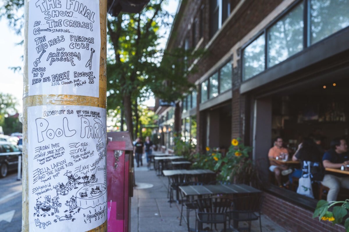 Live music flyers on Nicollet Ave in Minneapolis outside a restaurant.