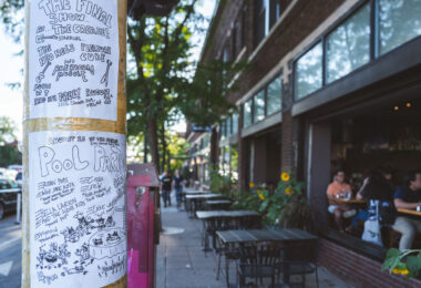 Live music flyers on Nicollet Ave in Minneapolis outside a restaurant.