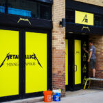 Window wrap going up on Hennepin Ave for a Metallica pop-up store. The band headlines two nights at US Bank Stadium this weekend.