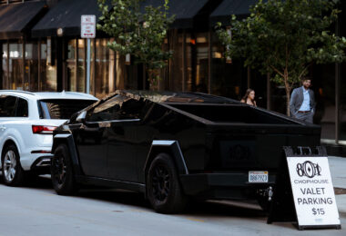 A Tesla Cybertruck at the valet parking stand outside 801 Chop