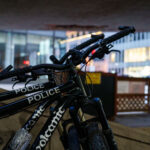 A Volcanic Bike brand "Patrol Bike" parked outside a downtown Minneapolis bar and grill. The bikes are used by the Minneapolis Police Department.