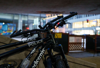 A Volcanic Bike brand "Patrol Bike" parked outside a downtown Minneapolis bar and grill. The bikes are used by the Minneapolis Police Department.