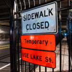 Layers of fencing up around the sidewalk on E 31st Street in Minneapolis. Fencing went up in stages after people pitches tents under the bridge.