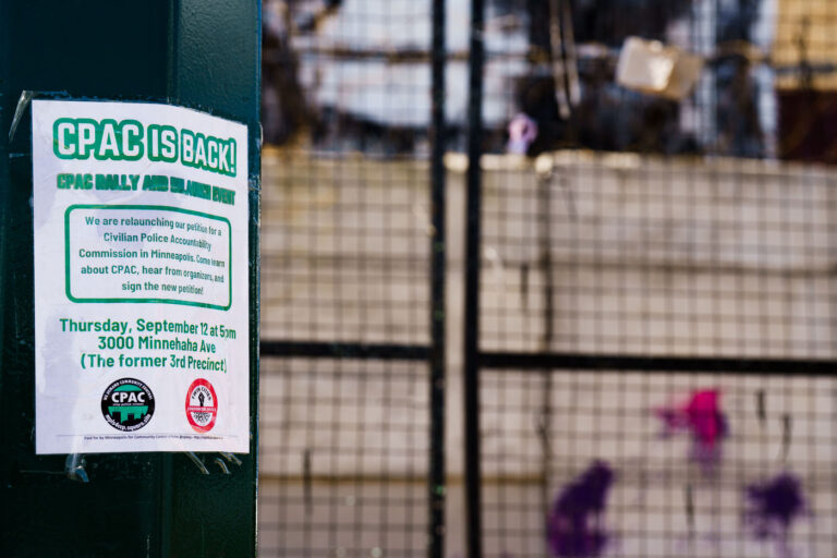 CPAC IS BACK 2 A flyer reading "We are relaunching our petition for a Civilian Police Accountability Commission in Minneapolis. Come learn more about CPAC, hear from organizers and sign the new petition!" found on a post outside the burned Minneapolis police third precinct police station.