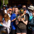 Woman wearing a Harris Walz hat at the Minnesota State Fair in September 2024.