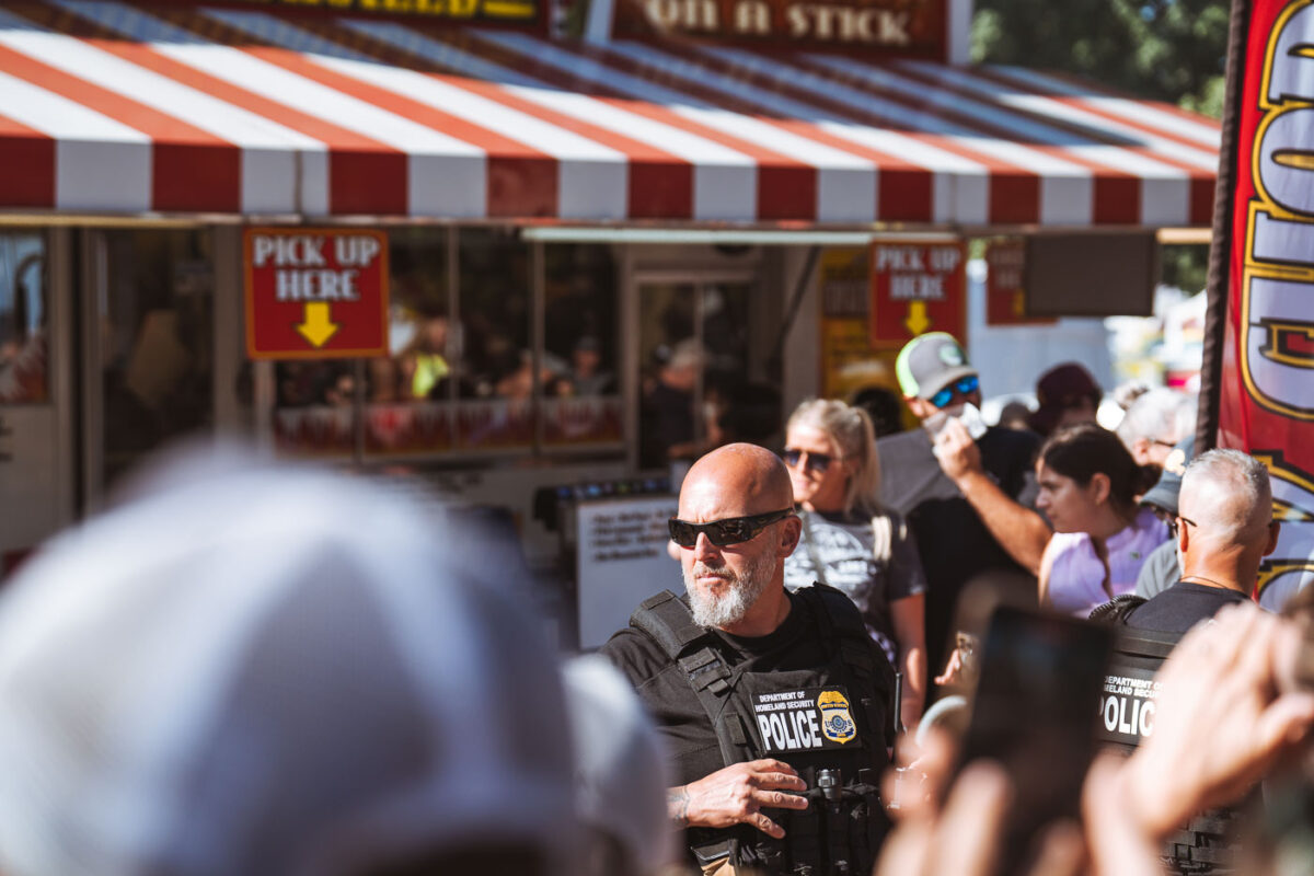 Homeland Security officer outside the Pork Chop On A Stick where Vice Presidential Candidate and current Minnesota Governor Tim Walz was set to make an appearance.