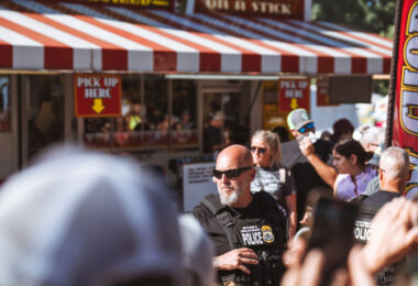 Homeland Security officer outside the Pork Chop On A Stick where Vice Presidential Candidate and current Minnesota Governor Tim Walz was set to make an appearance.