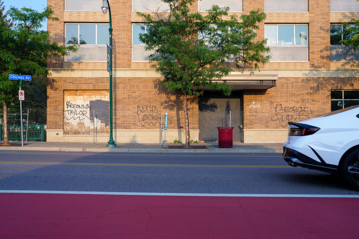 Breonna Taylor, Amir Locke, Ricky Cobb, and George Floyd written on the former Midtown Sheraton on Chicago Avenue in Minneapolis.