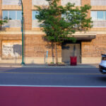 Breonna Taylor, Amir Locke, Ricky Cobb, and George Floyd written on the former Midtown Sheraton on Chicago Avenue in Minneapolis.
