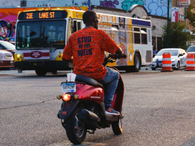 Man on Moped, Lake Street, Minneapolis