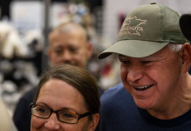 Vice Presidential Candidate and Minnesota Governor Tim Walz takes selfies at the Minnesota State Fair on September 1, 2024.