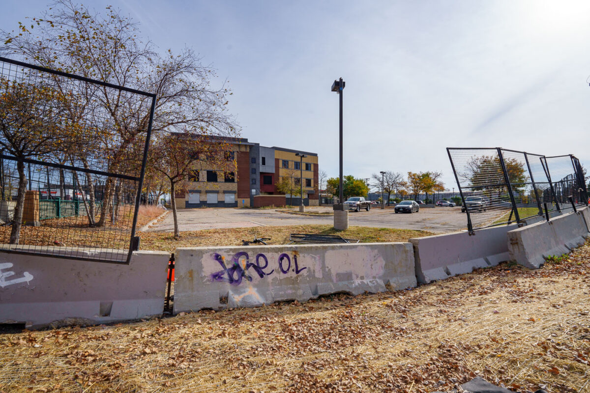 A man removes razor wire from the Minneapolis police third precinct police station. The razor wire was installed on the burned police station during the Derek Chauvin murder trial. The city says it'll be taking the concrete barricades down and replacing it with typical fabric lined construction fencing. The building, which was famously burned by protesters following the murder of George Floyd, is being redeveloped into a "Democracy Center" that'll be home to the city's election services and community use.