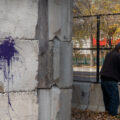 A man removes razor wire from the Minneapolis police third precinct police station. The razor wire was installed on the burned police station during the Derek Chauvin murder trial. The city says it'll be taking the concrete barricades down and replacing it with typical fabric lined construction fencing. The building, which was famously burned by protesters following the murder of George Floyd, is being redeveloped into a "Democracy Center" that'll be home to the city's election services and community use.