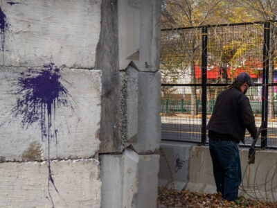 Razor wire removal at Minneapolis Third Precinct