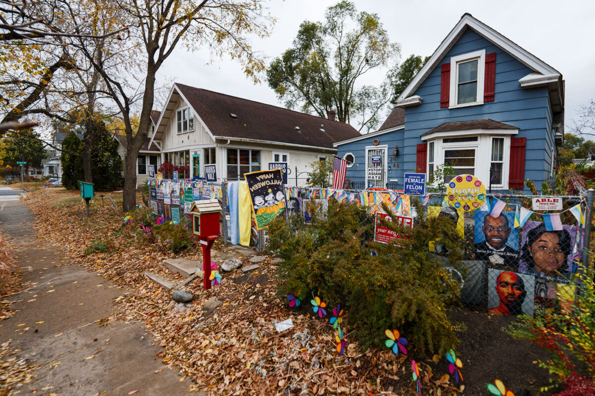 Political yard signs on the fence in front of a home in South Minneapolis prior to 2024 Presidential Election.