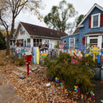 Political yard signs on the fence in front of a home in South Minneapolis prior to 2024 Presidential Election.