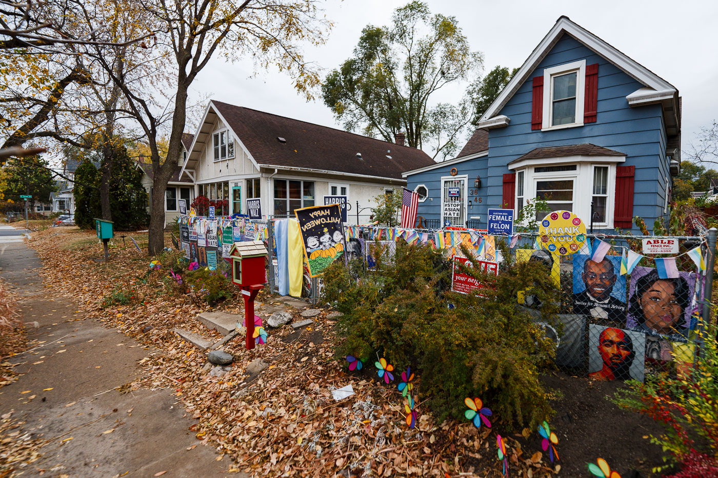 South Minneapolis yard signs on fence