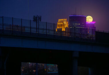 An October supermoon rising over the "big 3" buildings in downtown Minneapolis.